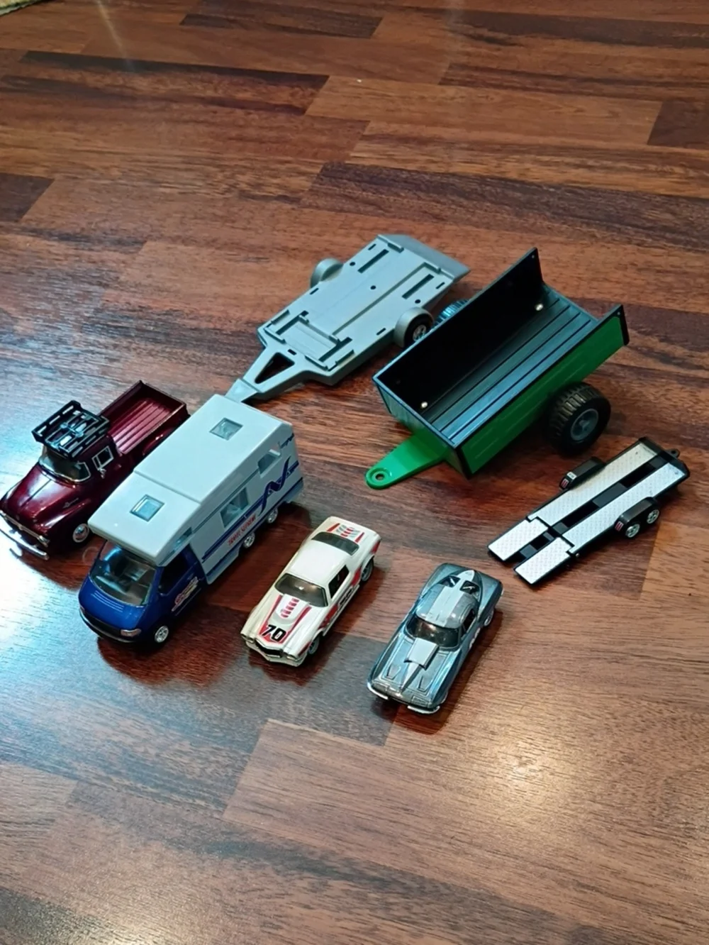 Toy cars, trucks, trailers